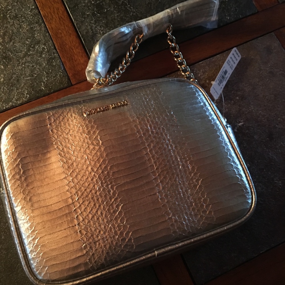 NWT Victoria’s Secret silver purse.